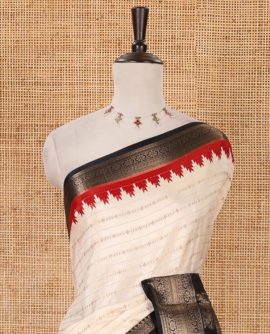 Cream veldhari zari  striped dola silk saree, contrast temple border of elephant & Annam motifs, striped temple pallu & contrast veldhari weaving blouse
