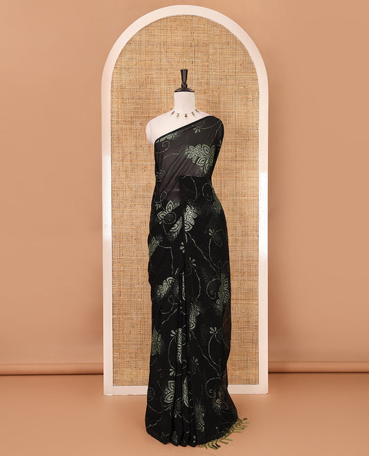Borderless black 60 gm georgette saree features floral vine designs red glitter embroidery work, contrast plain blouse