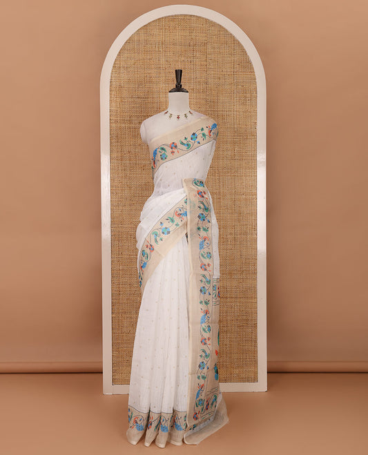 White small dotted buttas linen cotton saree, contrast border & pallu of paithani-style parrot, peacock, & floral vine designs