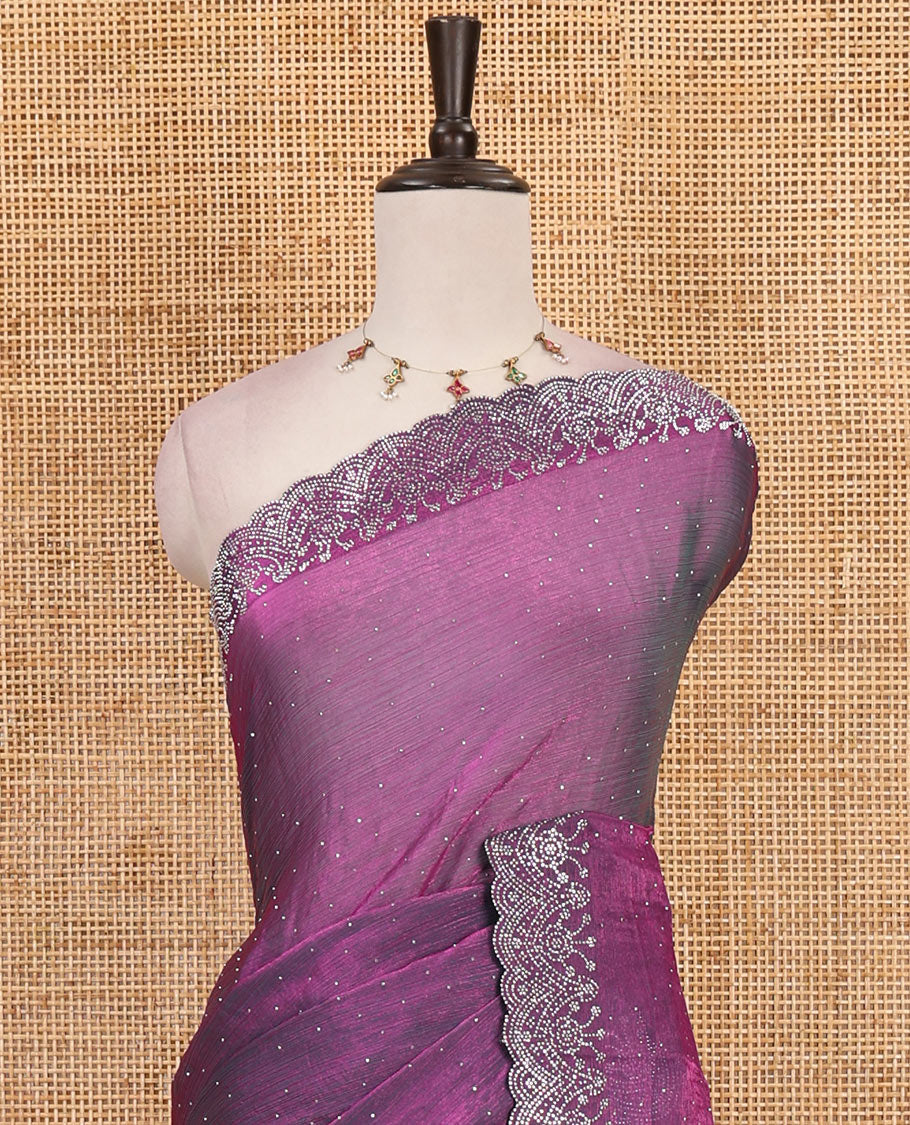 Purple Swarovski crystal stone embedded fendy chiffon saree, scallop border accentuated with floral and scallop design in Swarovski stones