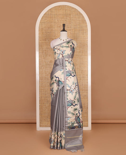 Grey gold zari dotted buttas semi tussar saree, contrast temple border features peacocks on the brand design print, striped pallu, and printed blouse