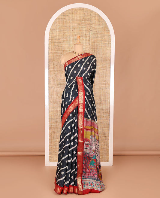 Black batik style lehariya stripes printed muslin silk saree, contrast peacock zari woven border, Mughal inspired painting style motifs printed pallu and a contrast blouse