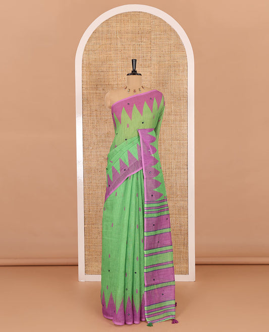 Green thilakam buttas and mirror work khadi mul cotton saree, contrast temple border, striped and buttas pallu, and a contrast printed blouse