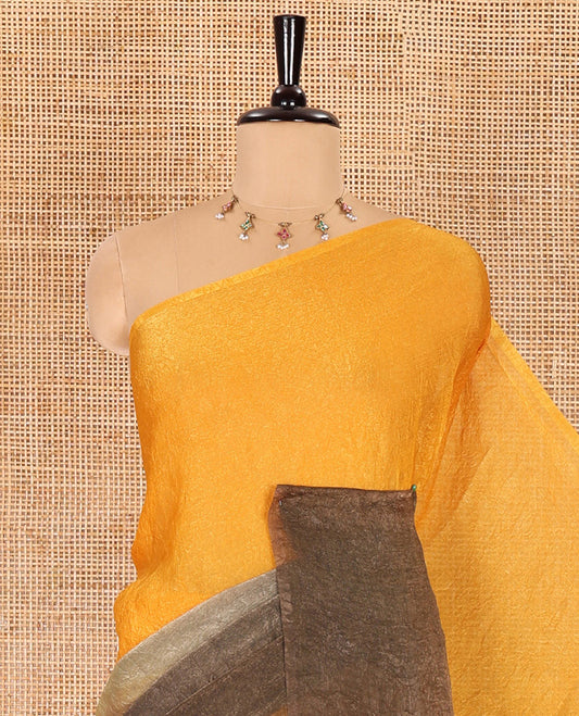 Borderless yellow and olive green ombre-style crushed plain fendy chiffon saree, self-pallu, and a matching plain blouse