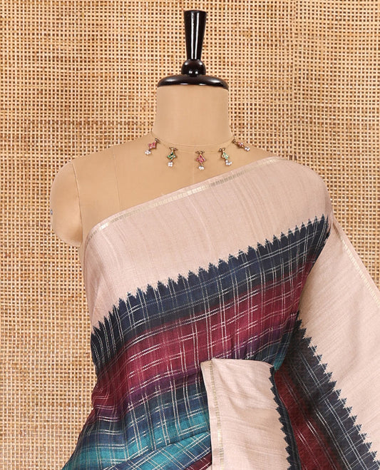 Blue checked semi-tussar saree, contrast temple border, contrast plain pallu, and a contrast plain blouse