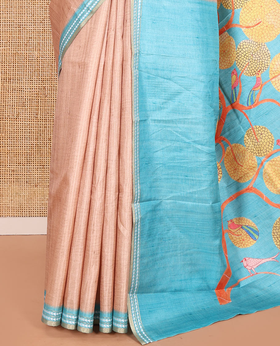 Chikku and Blue Plain Semi-Tussar Saree, Complemented by a Contrast Resham Thread Border, Tree of Life Printed Pallu, and Paired with a Contrast Bird Motifs Printed Blouse