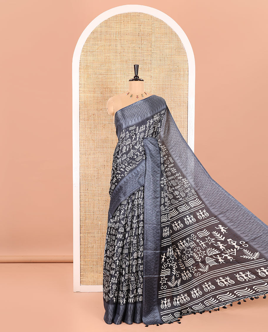 Blue Art Khadi Cotton Saree Ornamented with Warli-Village Theme Print, Complemented with a Contrasting Chevron-Printed Border, Vibrantly Warli-Printed Pallu, and a Plain Blouse