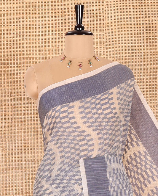 Chikku and Blue Kota Cotton Saree Subtly Woven with Zig-Zag Checks in Thread, Subtly Sparkled Contrast Bavanji Border, Plain Pallu, and Paired with a Matching Blouse