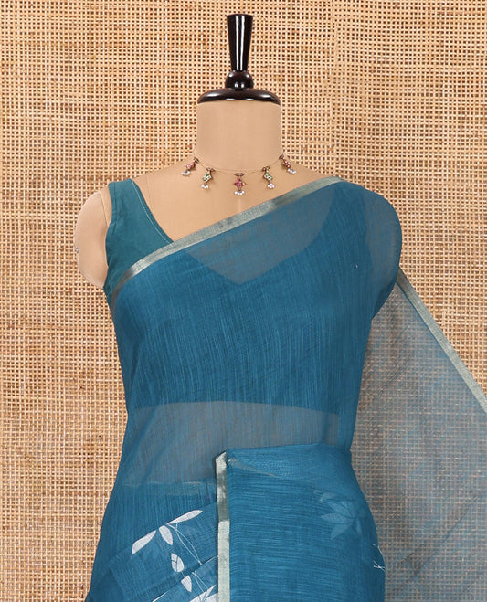 Blue Linen Cotton Saree, Adorned with Pichwai Lotus Motifs Print, Subtle Piping Border, Pallu Mirrors the Same Pichwai Lotus Print, and Paired with a Contrast Pichwai Lotus Printed Blouse