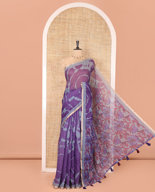 Violet Linen Cotton Saree, Adorned with Shibori Prints on Its Body, Subtle Contrast Piping Border, Pallu of Floral Print, and Paired with a Matching Blouse