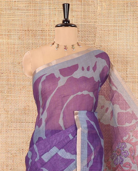 Violet Linen Cotton Saree, Adorned with Shibori Prints on Its Body, Subtle Contrast Piping Border, Pallu of Floral Print, and Paired with a Matching Blouse