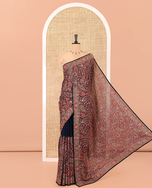 Navy Blue Georgette Saree, Ornamented with Intricate Paisleys, Kashmir Embroidered and Stone Work on Its Body, a Self-Embroidered Border, and Paired with an Embroidered Blouse