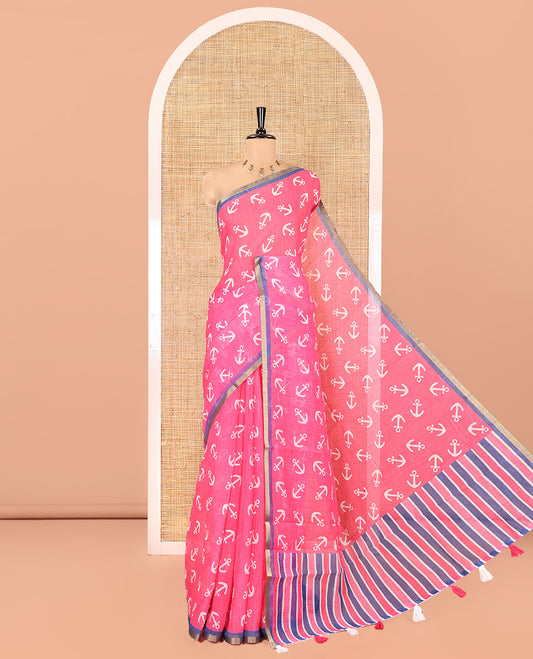 Rani Pink Linen Cotton Saree, Accentuated with Anchor Motifs Printed on Its Body, a Subtle Contrast Piping Border, Multi-Color Striped Pallu, and Paired with a Contrast Blouse