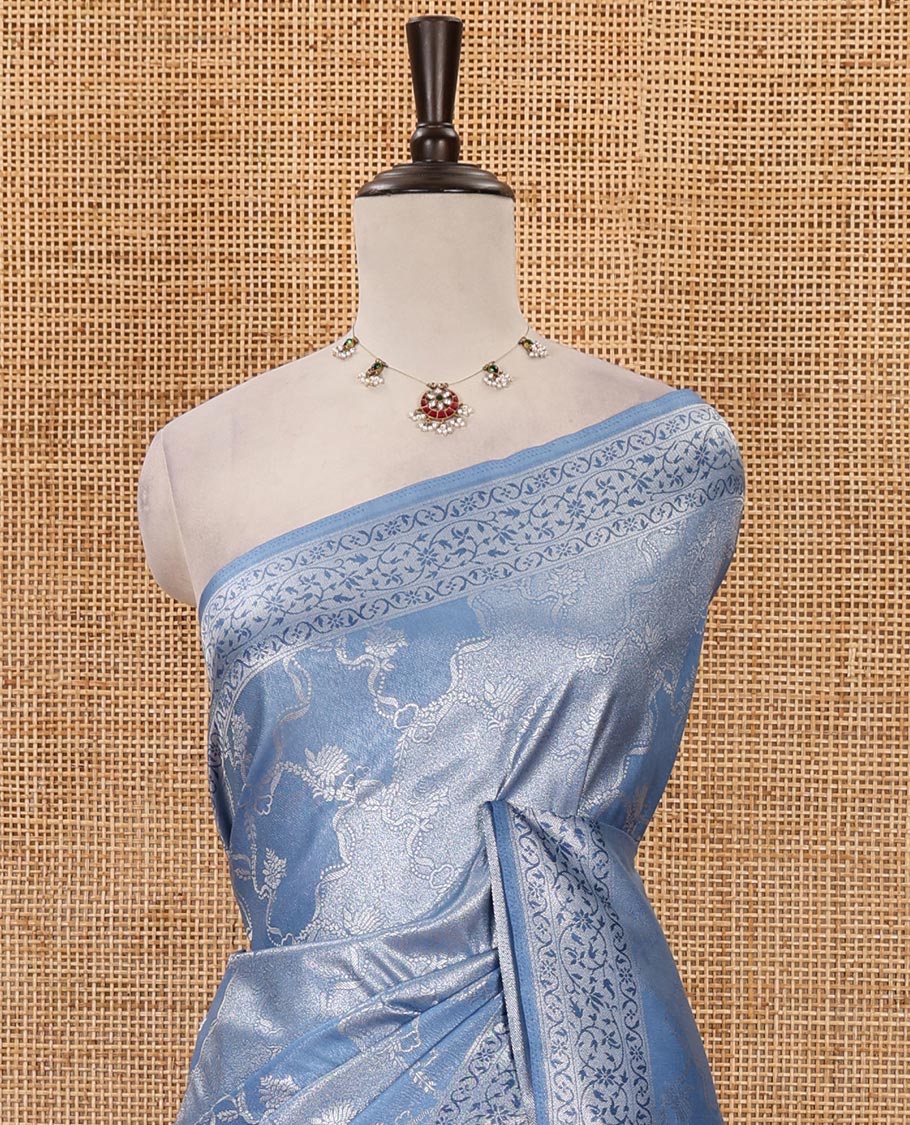 Blue lotus zari jacquard softy saree, floral vine zari border, zari woven floral design pallu & matching zari jacquard blouse