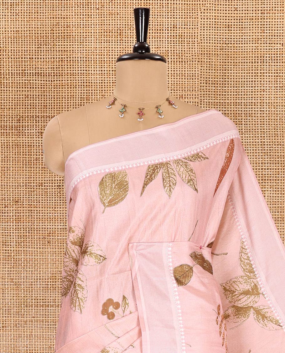 Light pink unique size and shaped leaf motifs printed fancy tussar saree, resham thread woven border, leaf motifs printed pallu, and a matching striped blouse