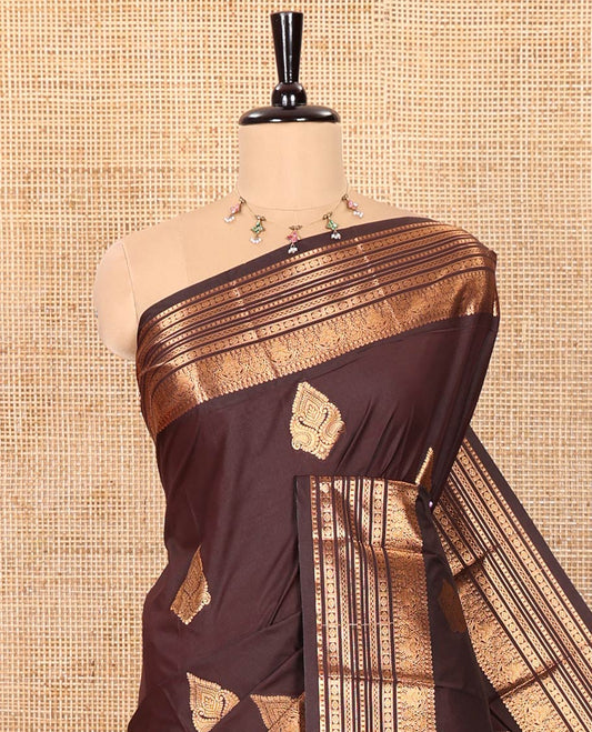Coffee Brown Kanchipuram Budget Silk Saree Beautified with Zari Buttas, Highlighted by Zari Border of Traditional Designs, Majestically Detailed Pallu of Intricate Designs, and Paired with a Matching Blouse