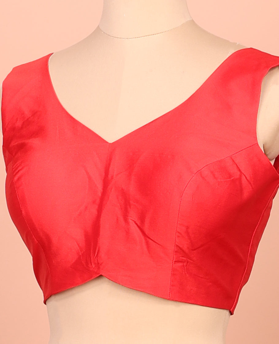 Red Plain Readymade Blouse Featuring a Front V-Neck, Back Deep V-Neck, and Sleeveless