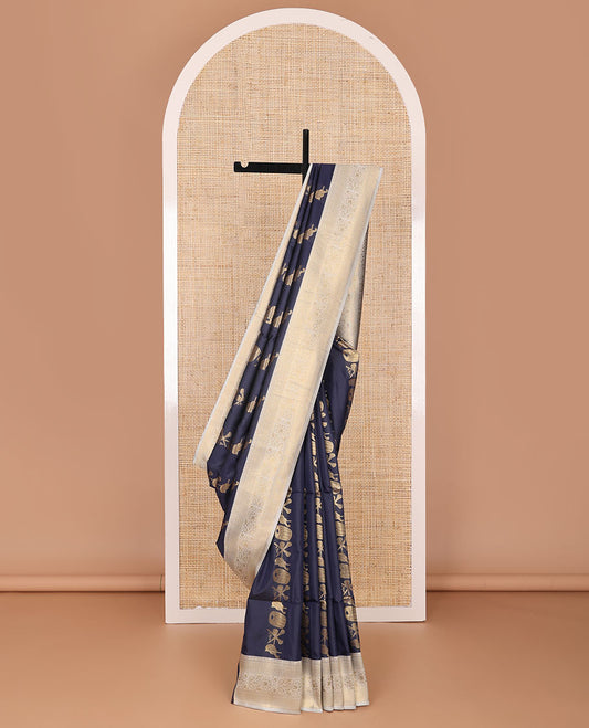 Blue semi-soft silk saree with musical instrument motifs in zari, contrast zari border of traditional designs, & pallu of intricate designs