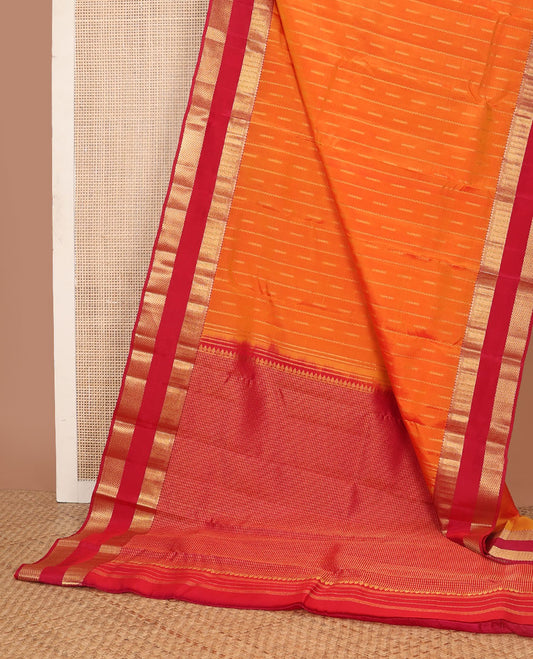 Orange zari buttas vasundhara elite silk saree, contrast rettai pettu zari border of thilakam, neli & paiyadi kann & intricate pallu