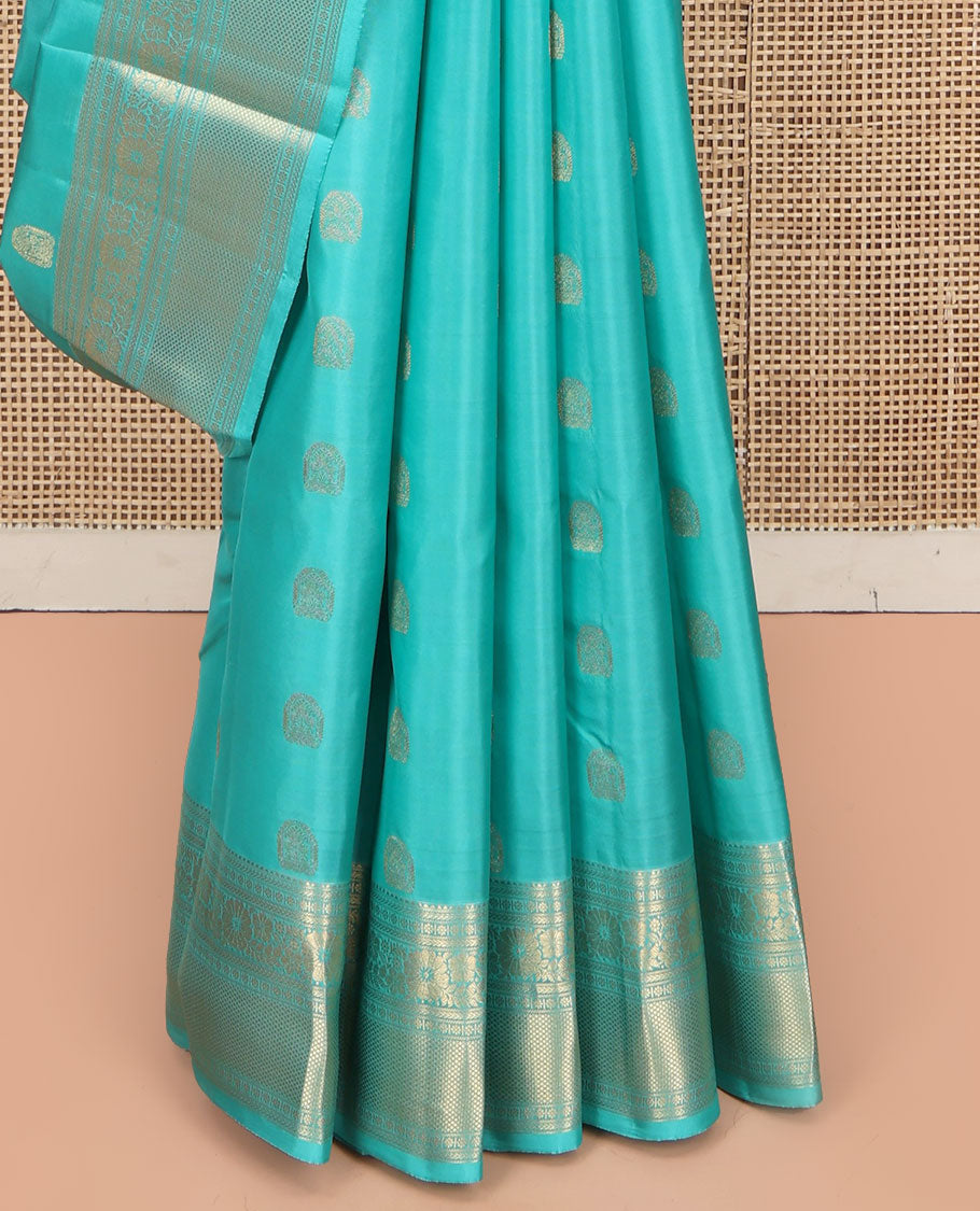 Blue Vasundhara Lite Silk Mix Saree, Sparsely Woven with Zari Buttas, Highlighted by a Zari Border of Rekku, Kamalam, and Mayil Kann Designs, Pallu of Jaal Designs, and Paired with a Matching Blouse