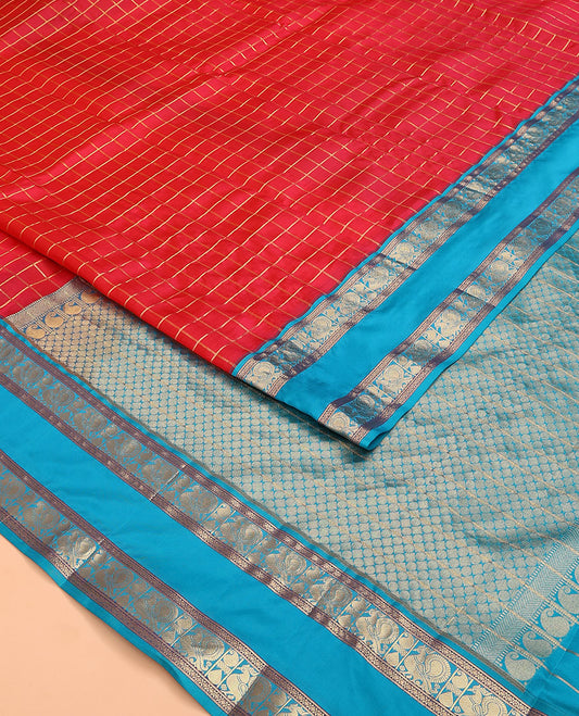 Red Vasundhara Lite Silk Mix Saree, Beautified with Zari Checked Designs on Its Body, Complemented by a Contrast Rettai Pettu Border of Cross Kamalam, Mayil, and Manga Designs, Gleaming Zari Design Pallu, and Paired with a Contrast Blouse