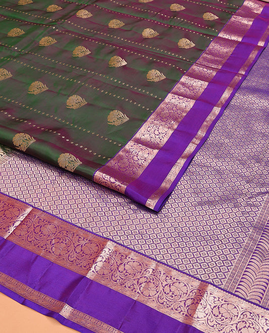 Green Dual-Toned Vasundhara Lite Silk Mix Saree, Majestically Detailed with Zari Buttas on Its Body, Complemented by a Contrast Rettai Pettu Border of Kodi Visiry Designs, Grandly Zari Woven Pallu of Jaal Designs, and Paired with a Contrast Blouse