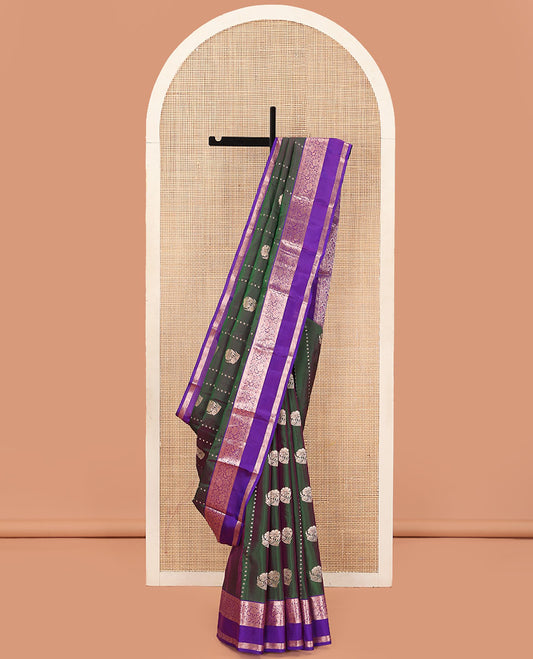 Green Dual-Toned Vasundhara Lite Silk Mix Saree, Majestically Detailed with Zari Buttas on Its Body, Complemented by a Contrast Rettai Pettu Border of Kodi Visiry Designs, Grandly Zari Woven Pallu of Jaal Designs, and Paired with a Contrast Blouse