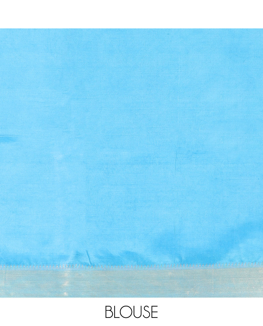 Blue Banana Pith Saree Decorated with Zari Temple Buttas, Delicately Woven Temple Zari Border, Gleaming Zari Pallu of Horizontal Stripes in Zari, and Paired with a Matching Plain Blouse
