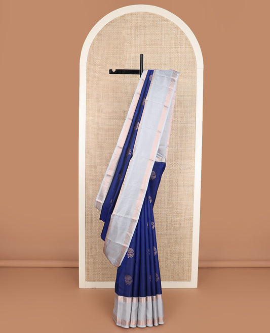 Blue floral zari buttas silk saree, contrast border of thilakam, muthu, ara maadam, kuyil kann, and vanki designs, and jaal pallu