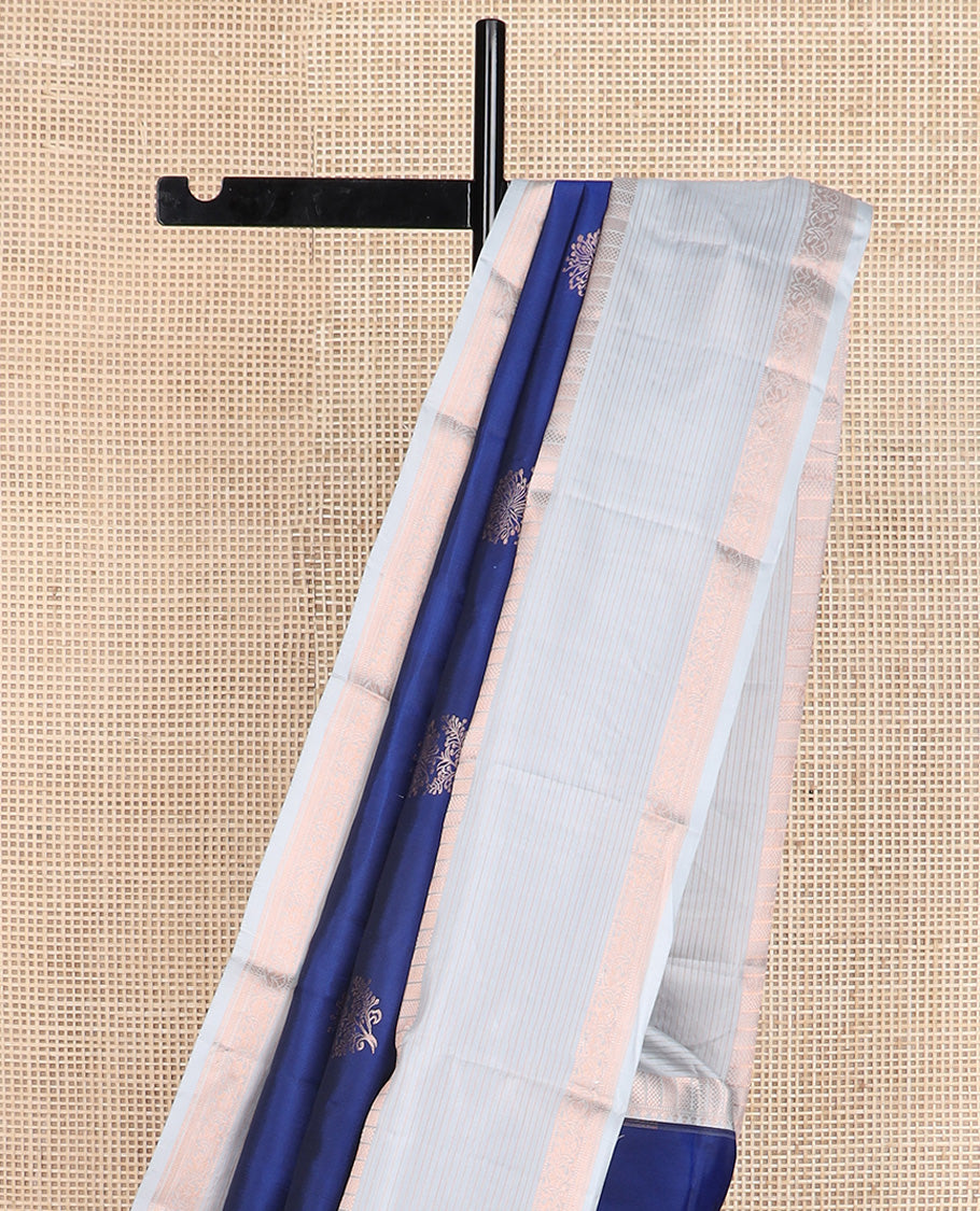 Blue floral zari buttas silk saree, contrast border of thilakam, muthu, ara maadam, kuyil kann, and vanki designs, and jaal pallu