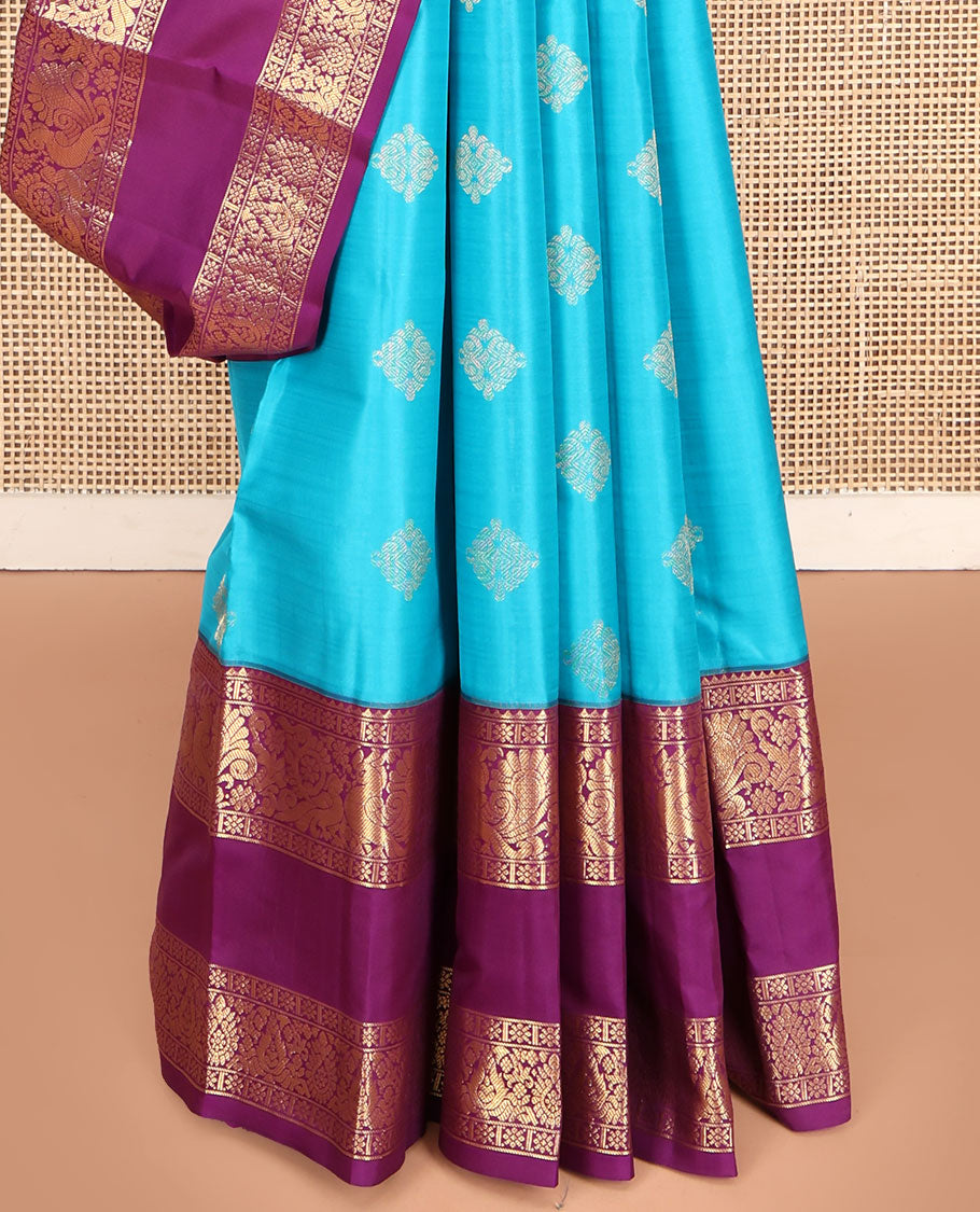 Blue Vasundhara Lite Silk Mix Saree, Detailed with Zari Buttas on Its Body, Complemented by a Contrast Zari Border of Rekku, Kamalam, and Mayil Designs, Grandly Scallop Design Pallu, and Paired with a Contrast Blouse