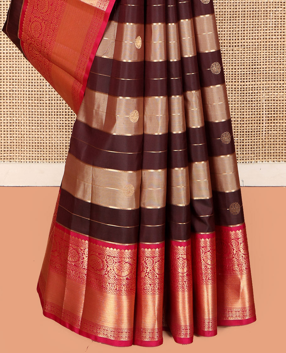 Brown Vasundhara Silk Saree, Woven with Zari Buttas and Stripes, Complemented by Contrast Border of Thilakam Mokku, Puli Nagam, and Kodi Visiry Designs, Vanki Pallu, and Contrast Blouse