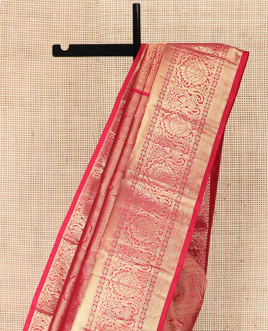 Red Kanchipuram Silk Saree Artfully Detailed with Jacquard Design, Highlighted with Zari Border of Thilakam, Muthu, Mayil Kann, Diamond, and Kamalam Designs, Gracefully Embellished Pallu, and Paired with a Matching Blouse