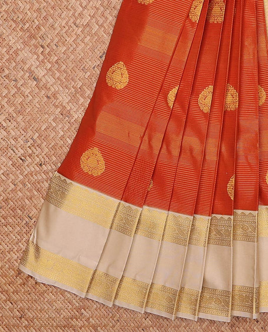 Orange zari design gift saree, contrast traditional zari rettai pettu border, and jaal pallu