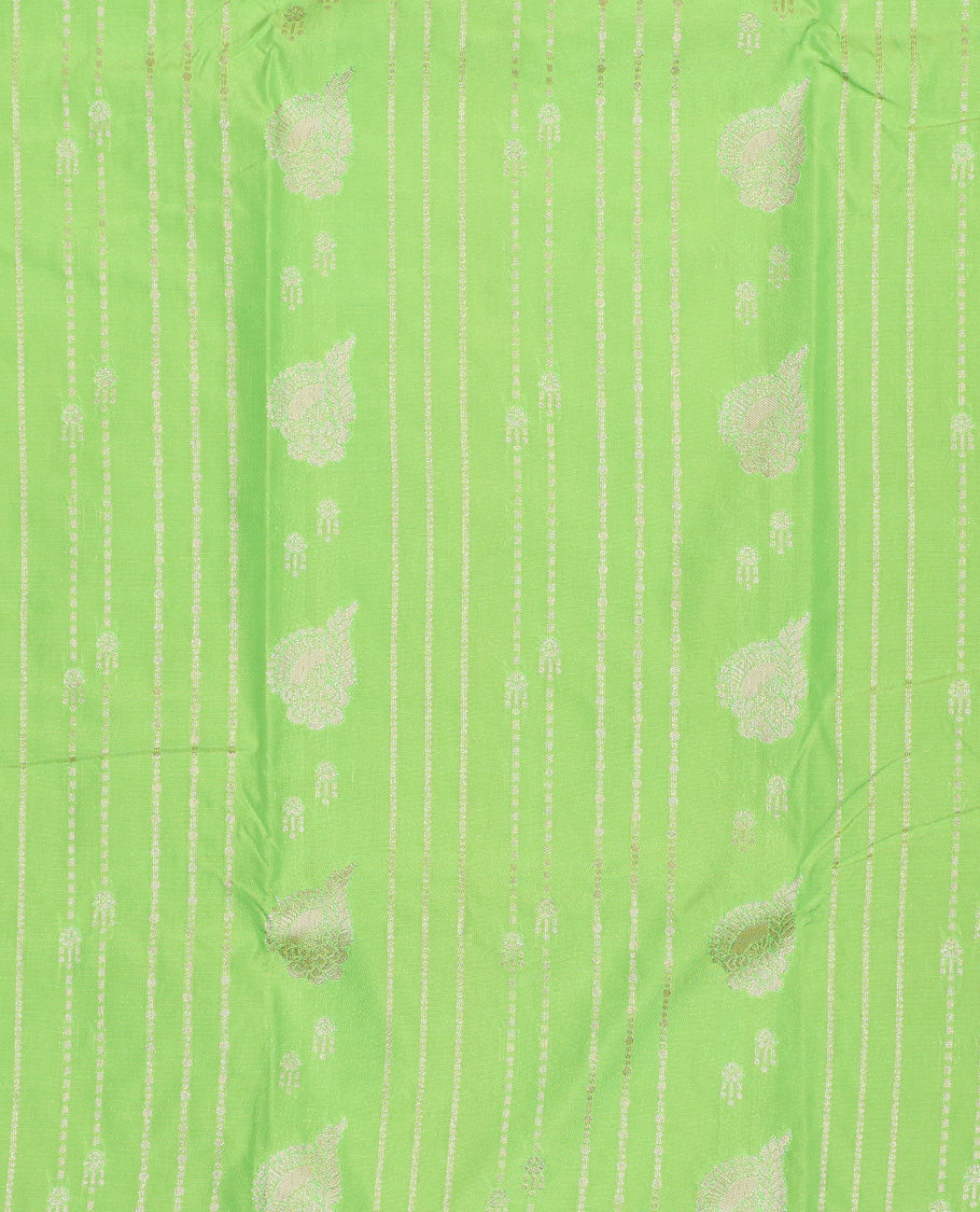 Green art silk pavadai set, zari design with contrast traditional zari bordered skirt and a contrast zari design blouse