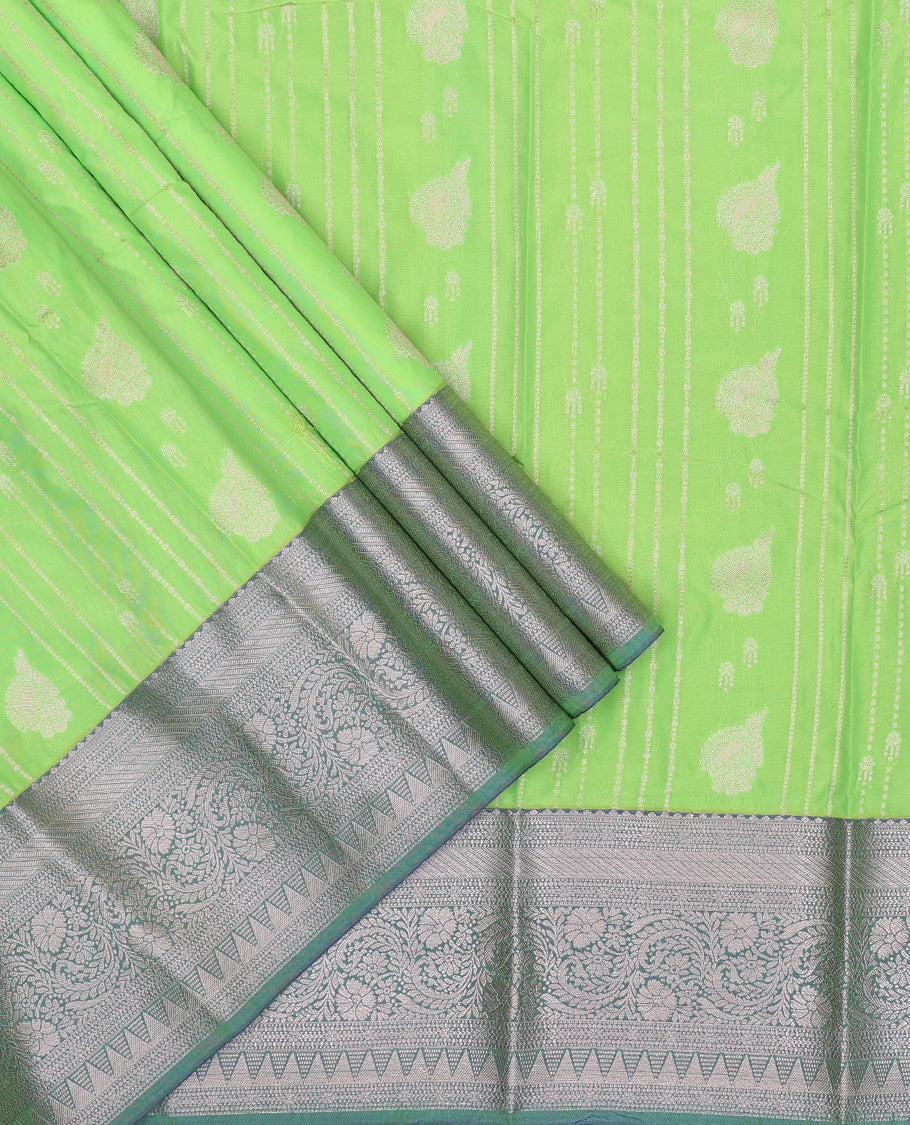 Green art silk pavadai set, zari design with contrast traditional zari bordered skirt and a contrast zari design blouse