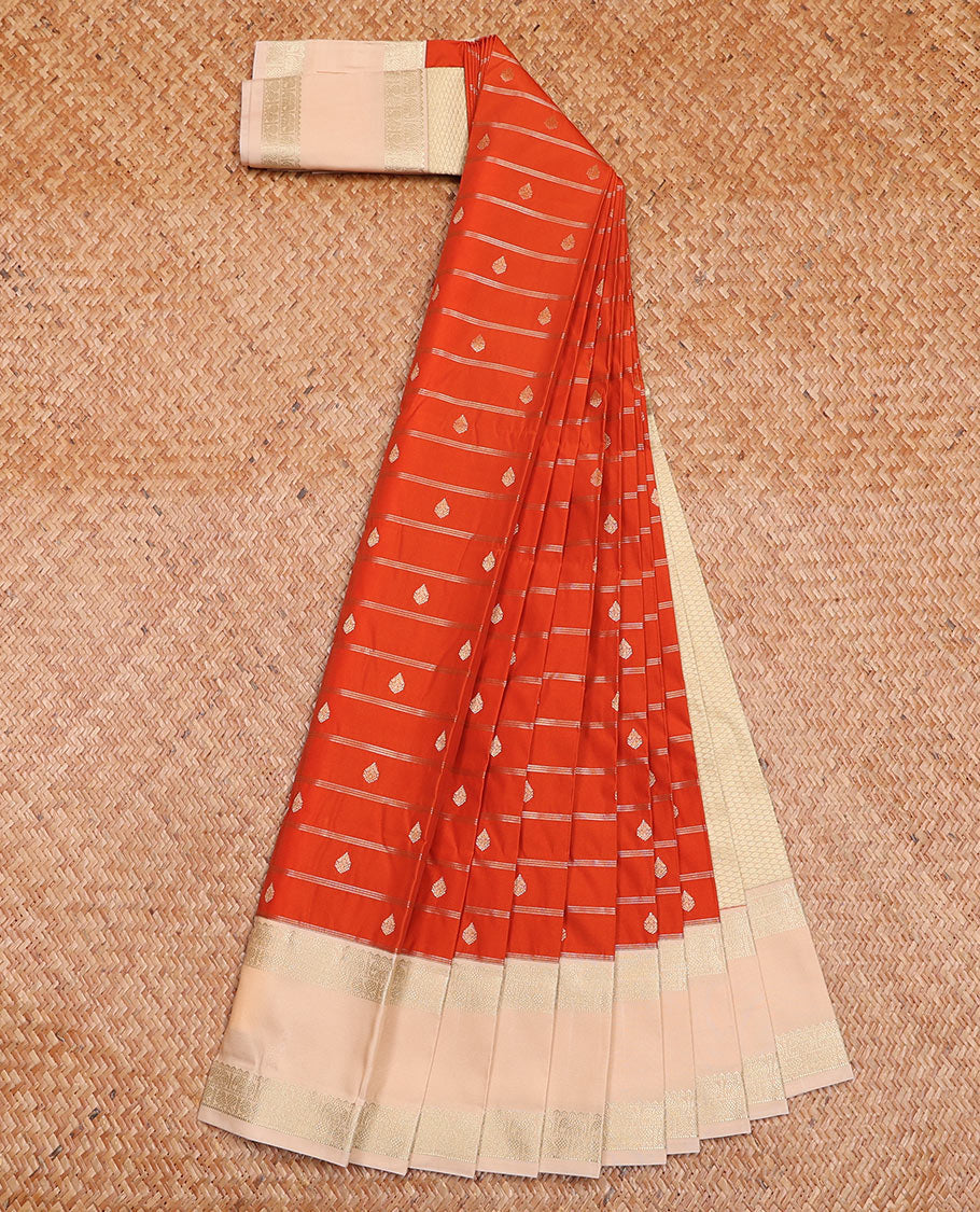 Orange Budget Silk Saree Enthralled with Zari Stripes and Zari Buttas, Highlighted with a Contrast Traditional Zari Border, Subtly Woven Jaal Pallu, and Paired with a Contrast Blouse