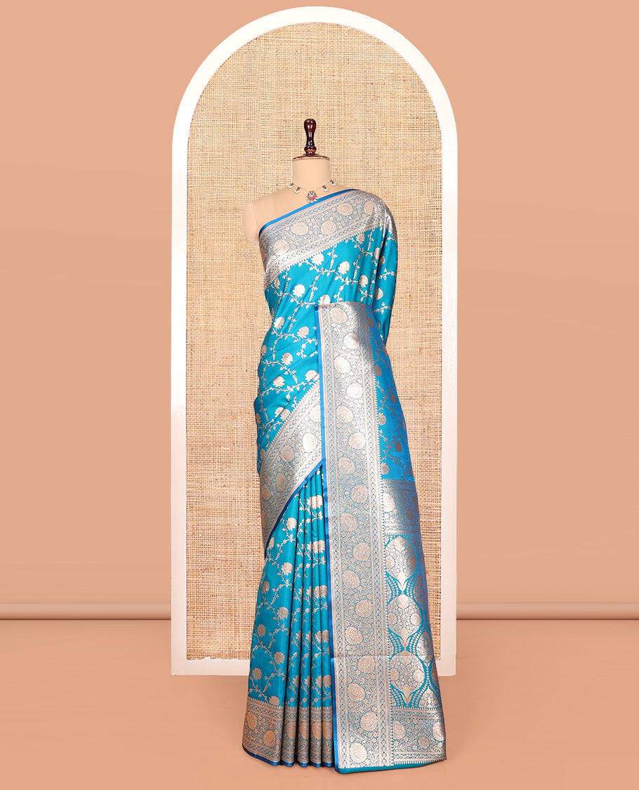 Light Blue Banarasi Nylon Saree, Detailed with Jacquard, a Floral Creeper Zari Border, Intricate Pallu, and a Matching Blouse