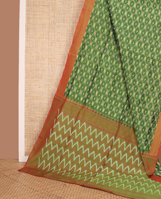 Green ogee patterned ikkat cotton saree, contrast plain border, and chevron striped pallu