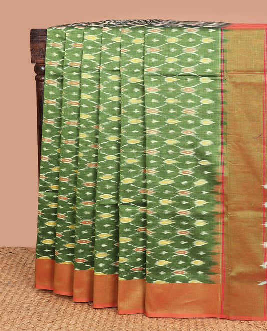 Green ogee patterned ikkat cotton saree, contrast plain border, and chevron striped pallu