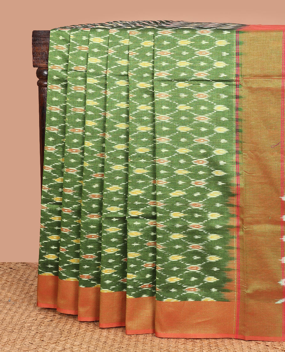 Green ogee patterned ikkat cotton saree, contrast plain border, and chevron striped pallu