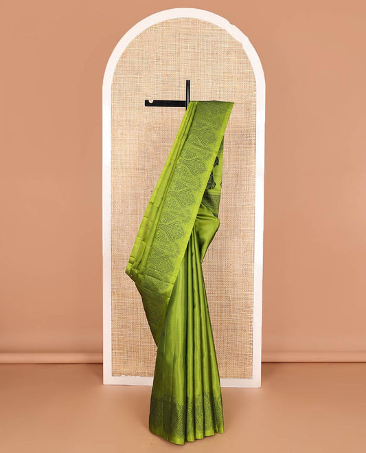 Green buttas soft silk saree, self-border, and pallu of intricate designs