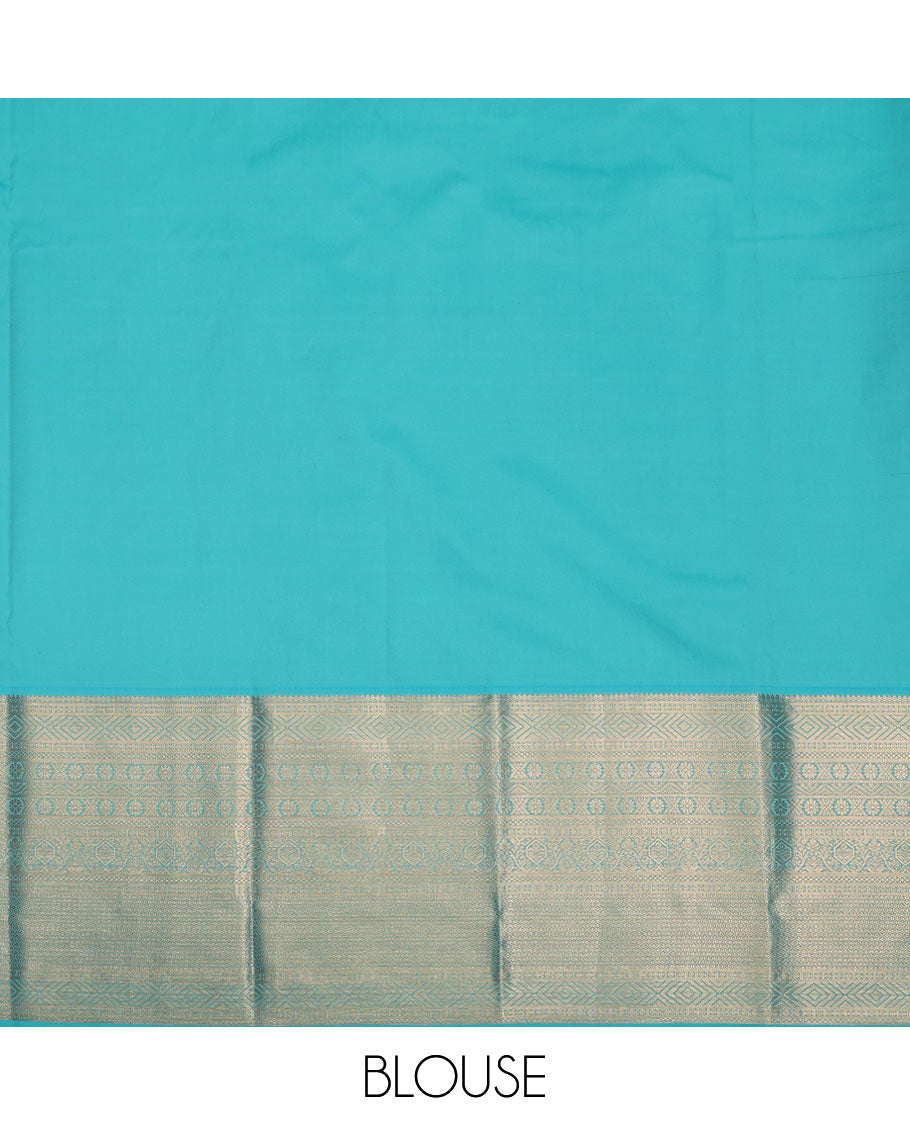Green pure-silk half-saree, jacquard skirt, contrast blouse, and border of thilakam, banaras, poun, diamond, cross kamalam, and then kuli kann designs, and intricate dhavani