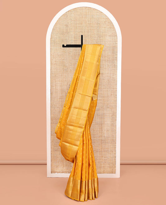 Yellow Vasundhara Lite Silk Mix Saree, Subtly Sparkled with Zari Buttas All Over Its Body, Highlighted by Traditional Zari Designs, Grand Pallu and Paired with a Matching Blouse