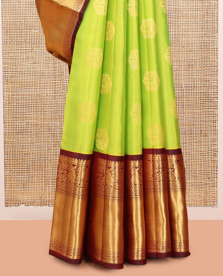 Green Vasundhara Silk Saree, Woven with Zari Buttas, a Contrast Border of Neli, Mayil, Kodi Visiry, and Vanki Designs, Grand Pallu, and a Contrast Blouse