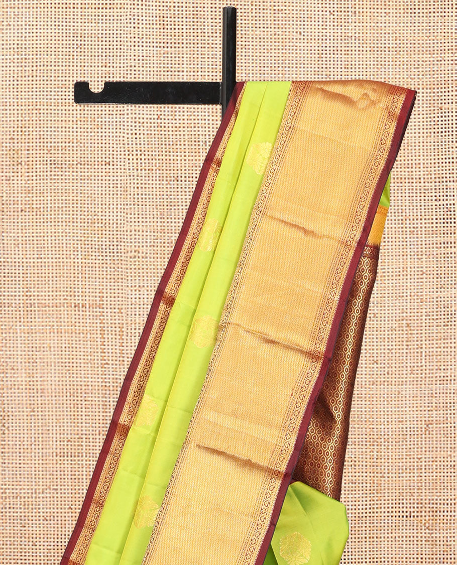 Green Vasundhara Silk Saree, Woven with Zari Buttas, a Contrast Border of Neli, Mayil, Kodi Visiry, and Vanki Designs, Grand Pallu, and a Contrast Blouse