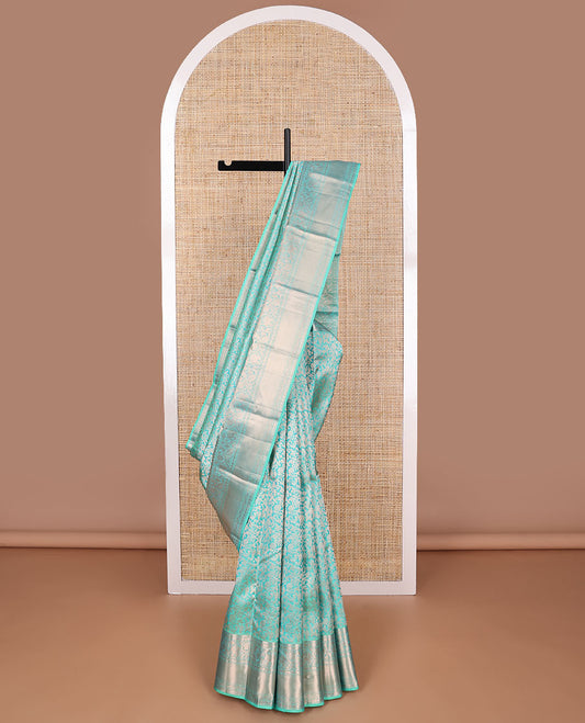 Light blue jacquard kancheepuram silk saree with self border of intricate zari design & floral design pallu