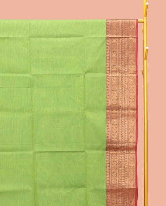 Parrot Green Plain Chettinad Cotton Saree, Complemented by a Contrast Traditional Zari Design Woven Border, Pallu of Stripes, and Paired with a Matching Blouse