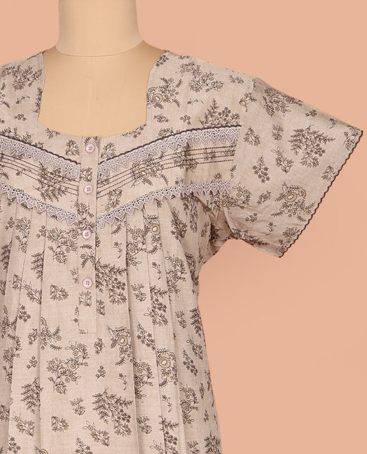 Pale Brown Cotton Nighty Subtly Sparkled with Floral Print, Featuring Lace Work, Square Front Neck, and Half  Sleeves