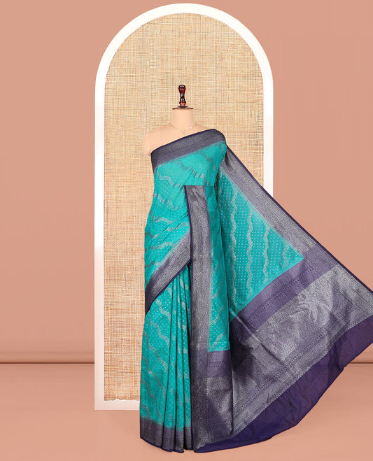 Blue Dola Silk Saree, Woven with Zari Buttas and Chevron on Its Body, Complemented by Contrast Zari Border, Gleaming Zari Pallu, and Paired with a Contrast Blouse